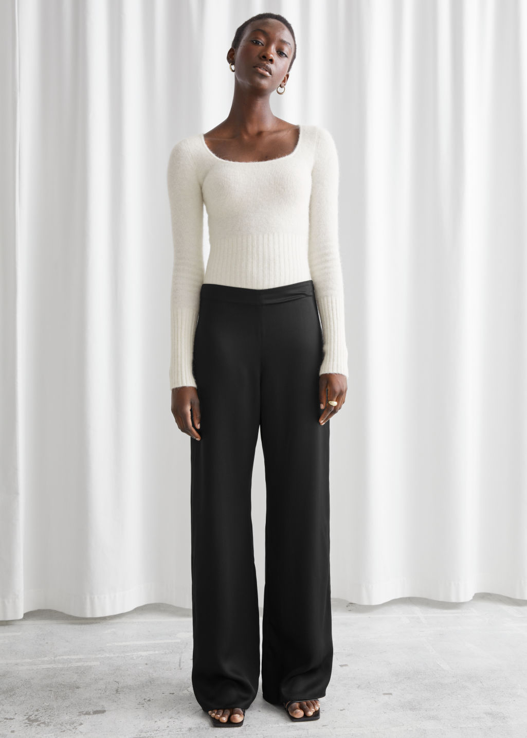 Relaxed Flared Trousers - Black - Trousers - & Other Stories